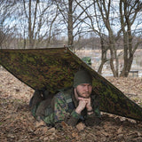 Using a rain cape as a shelter