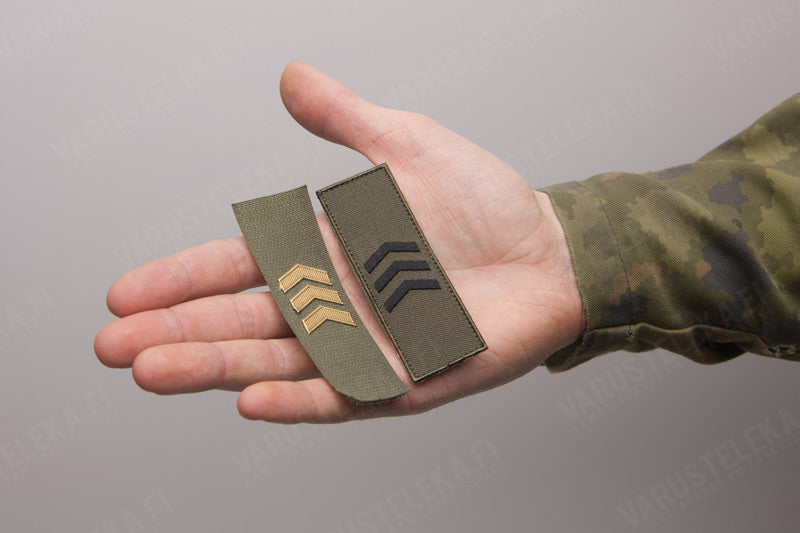 An embroidered insignia patch is wear-resistant and doesn't shine.