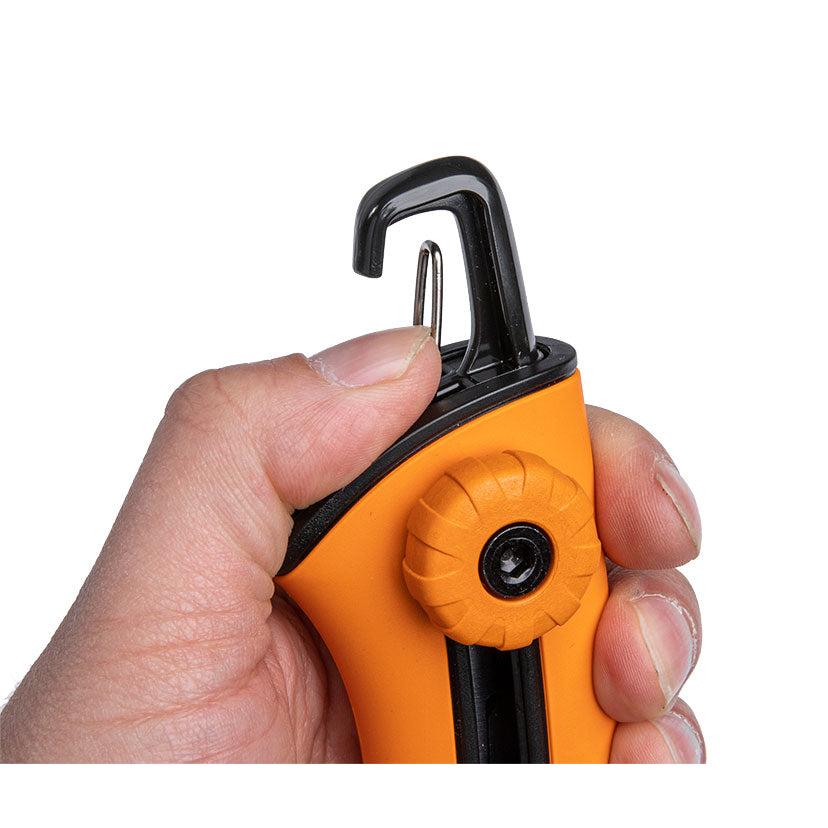 When clipped onto something the saw is prevented from opening.