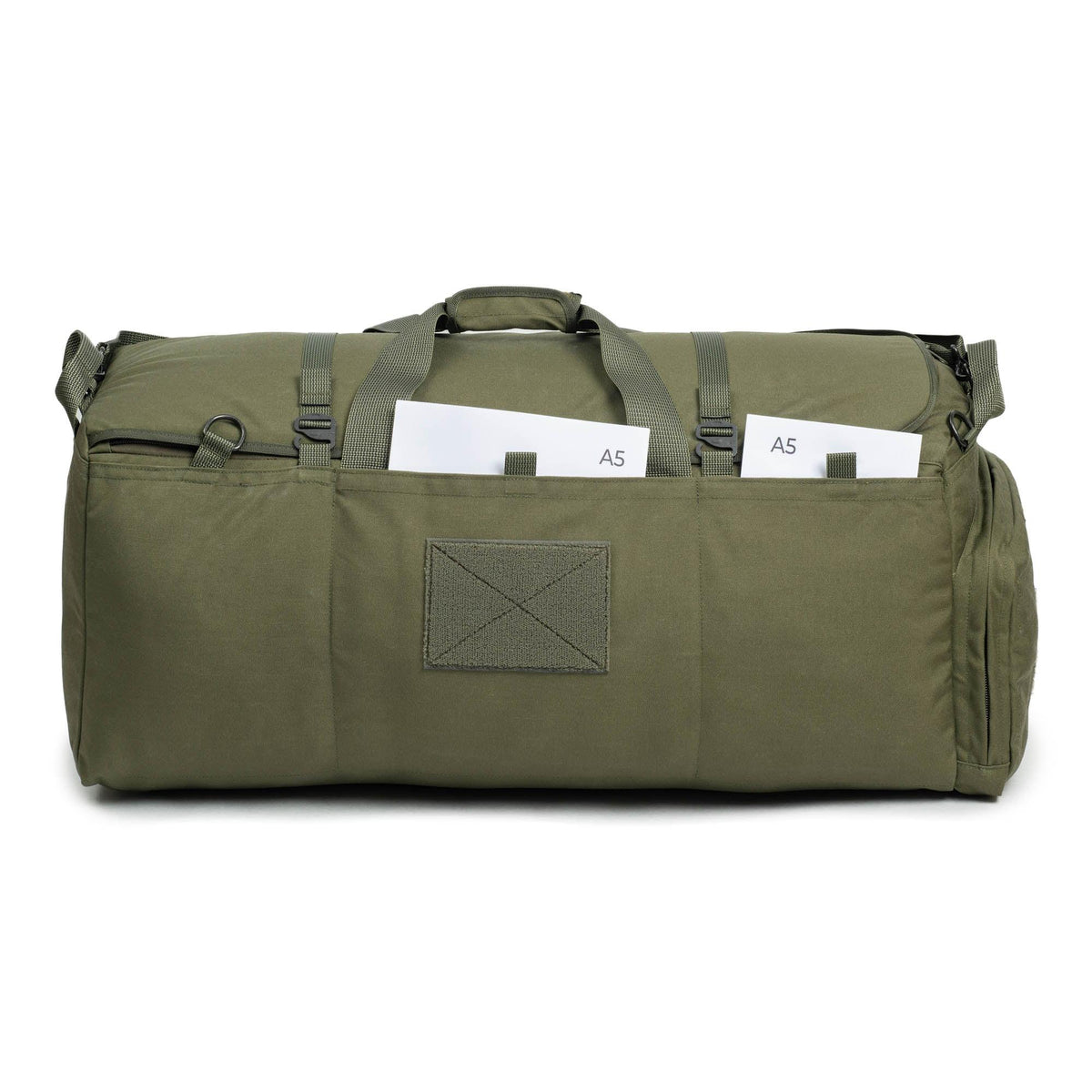 Flat slash pockets with hook-and-loop closures.