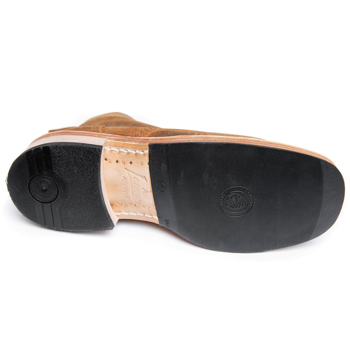 Rubber heel piece and half-sole. Note the brass screws.