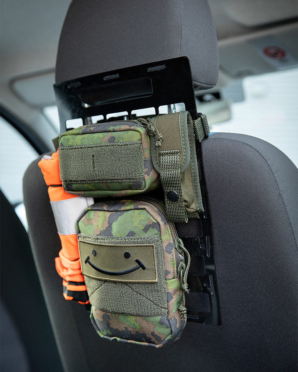 Der taktische/kinderfreundliche Platz im Auto.