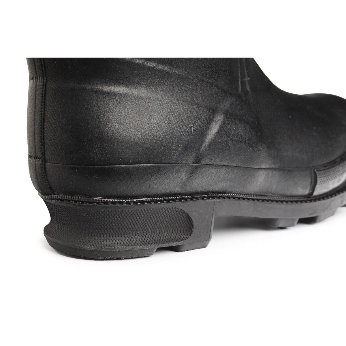 The heel features a groove for traditional ski binding loops