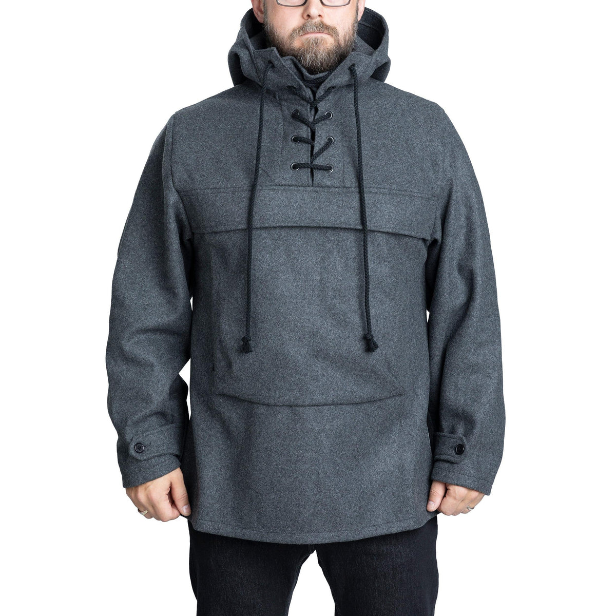 The same model wearing the size Small/medium. Fits nicely but doesn't allow thick mid-layers.