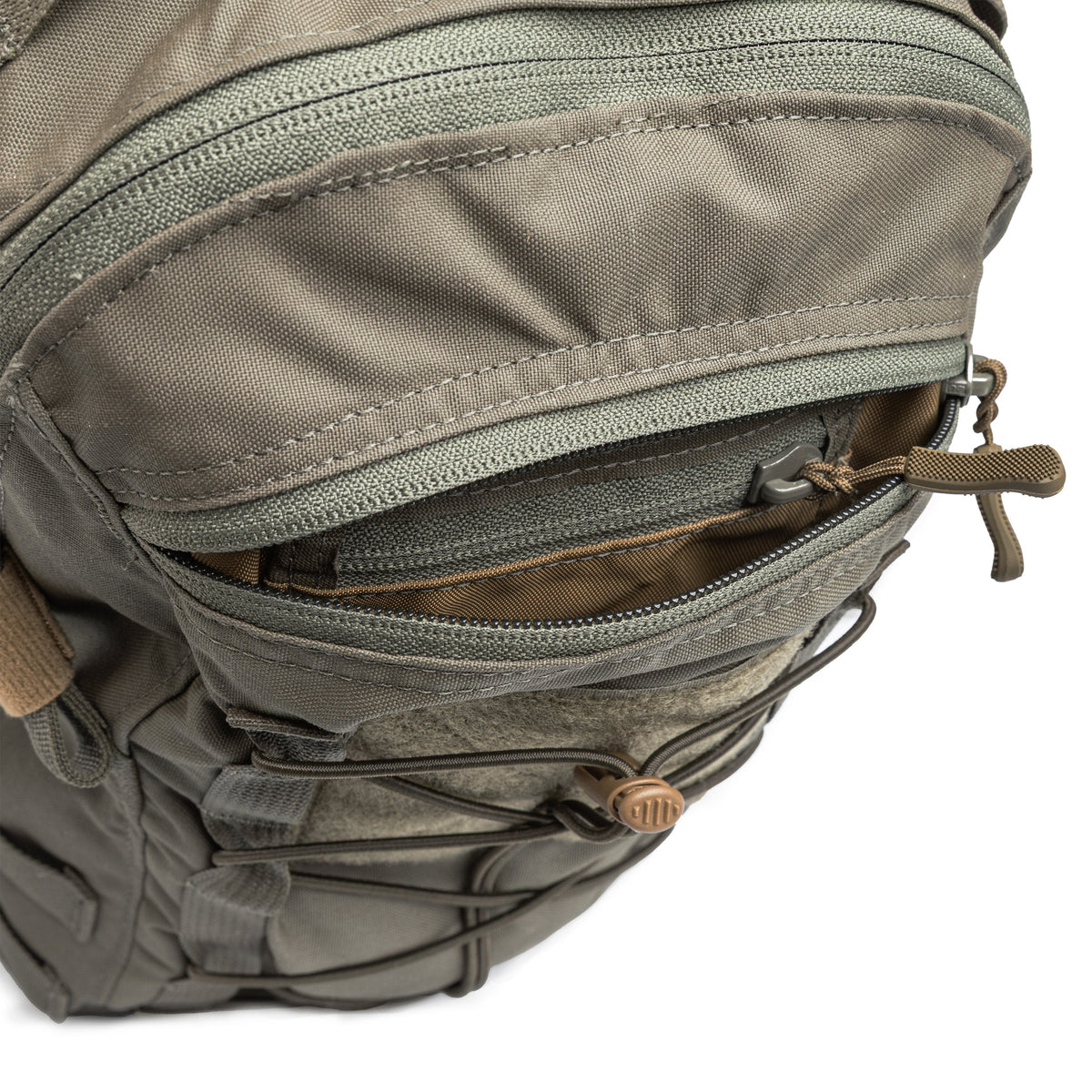The pack has a smaller compartment with another pocket for small items.