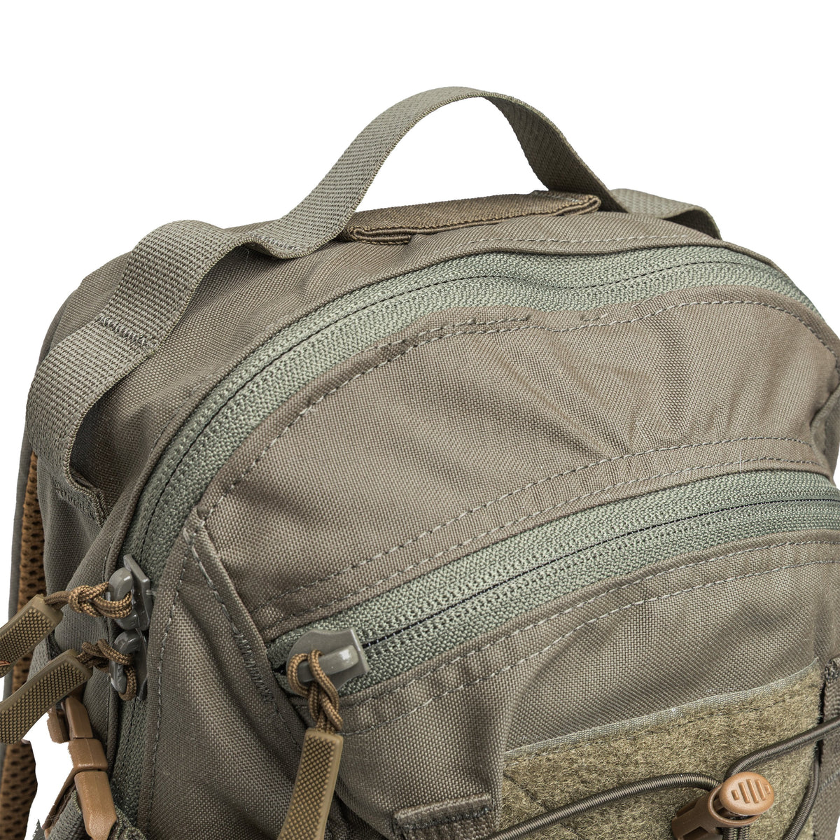 The pack has a carry handle; and some PALS webbing on both sides.